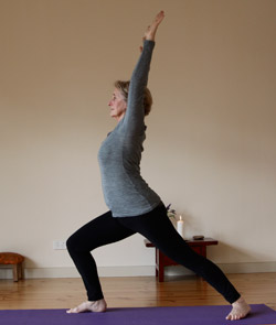 Janet Coutts practices Yoga in the main Yoga space at Norwood Yoga House